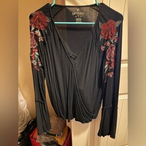 Black long sleeve top with floral sleeves